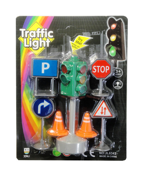 Sygnalizator ze światłem oraz znaki drogowe